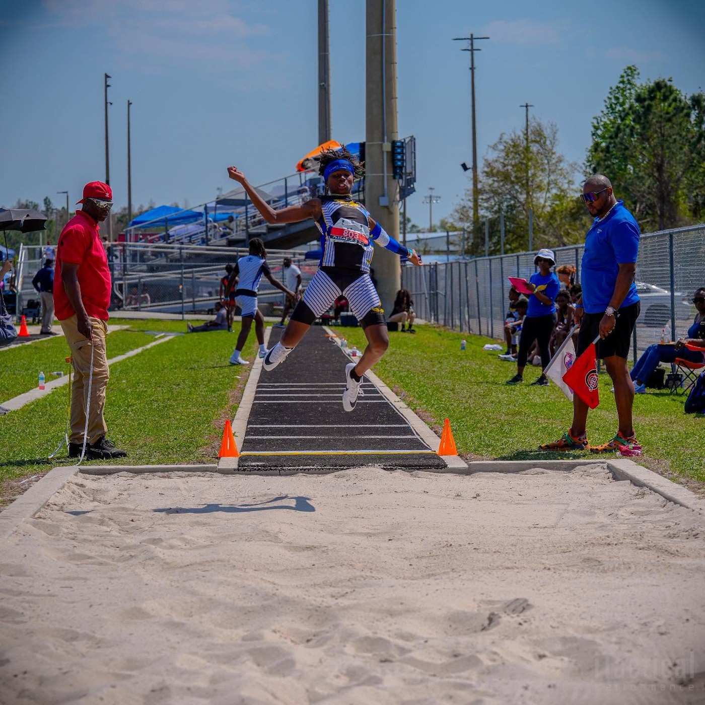 Tampa Xpress athlete competing in the long jump